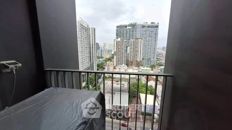 Stunning city view from modern balcony in high-rise apartment