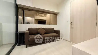 Cozy modern living room with brown sofa and sleek design