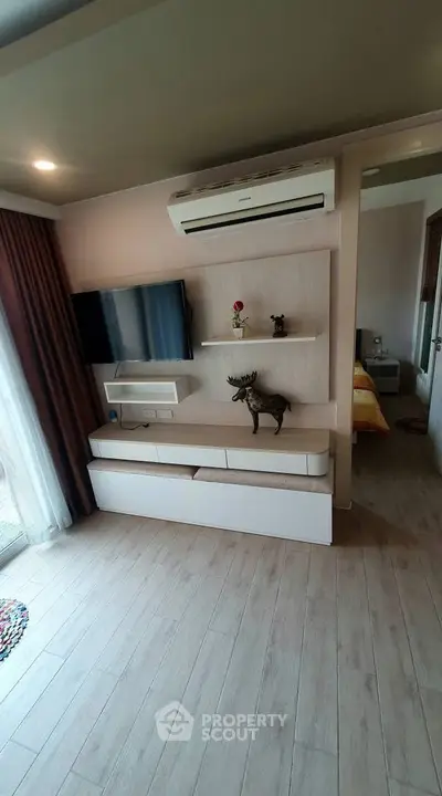 Modern living room with air conditioning and stylish decor