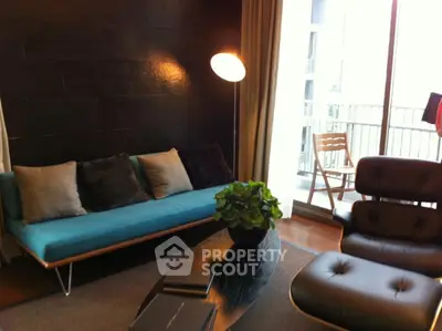 Stylish living room with modern furniture and balcony view