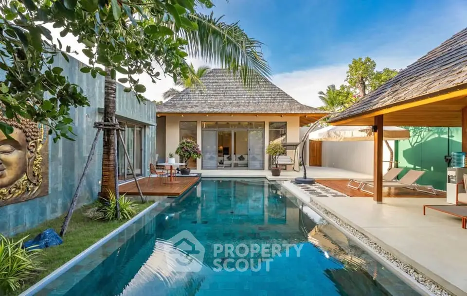 Luxurious villa with private pool and tropical garden, perfect for relaxation and leisure.
