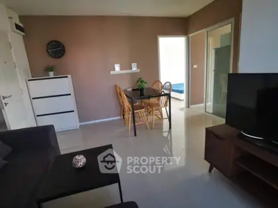 Modern living room with sleek furniture and open layout, perfect for contemporary living.