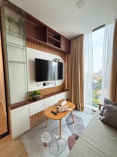 Modern living room with wall-mounted TV and large window view