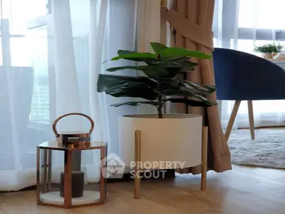 Stylish living room corner with modern decor and natural light