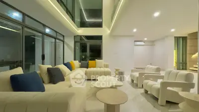 Luxurious modern living room with elegant furniture and ambient lighting