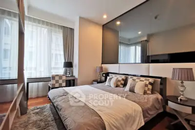 Luxurious modern bedroom with elegant decor and large windows