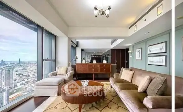 Luxurious high-rise living room with panoramic city views and elegant furnishings.