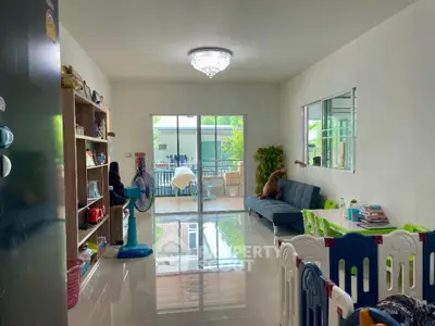 Spacious living room with sliding glass doors and modern decor
