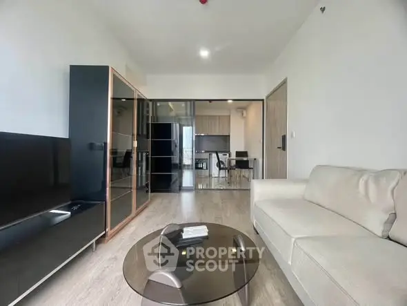 Modern living room with sleek furniture and open layout, perfect for contemporary living.