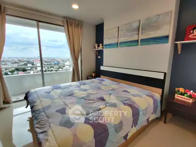 Modern bedroom with stunning city view and cozy decor