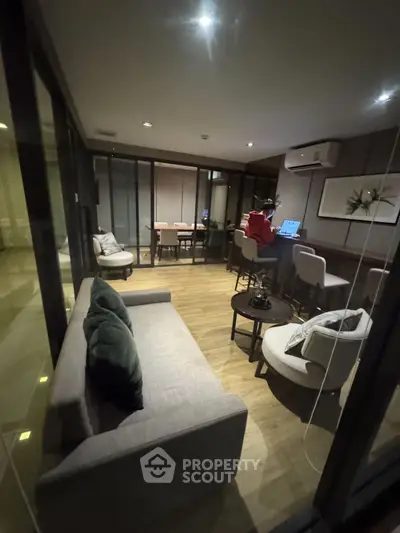 Modern living room with stylish furniture and open layout, perfect for entertaining guests.