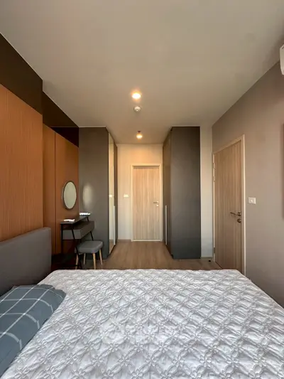 Modern bedroom with stylish decor and cozy ambiance