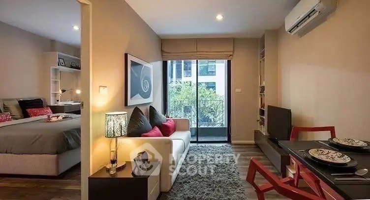 Modern studio apartment with cozy living area and stylish decor