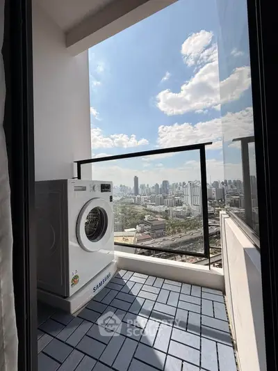Modern balcony with washing machine and stunning city skyline view