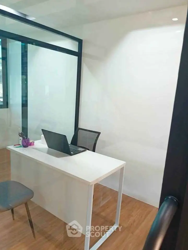 Modern office space with sleek desk and chair, ideal for productivity and focus.