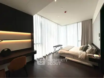 Luxurious modern bedroom with floor-to-ceiling windows and elegant decor