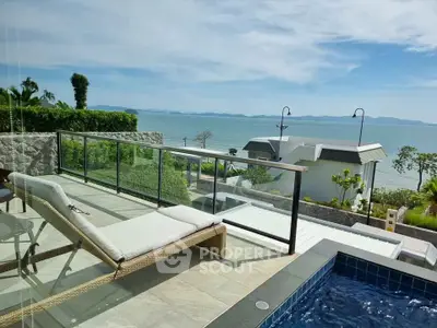 Luxurious seaside balcony with stunning ocean view and private pool, perfect for relaxation and leisure.