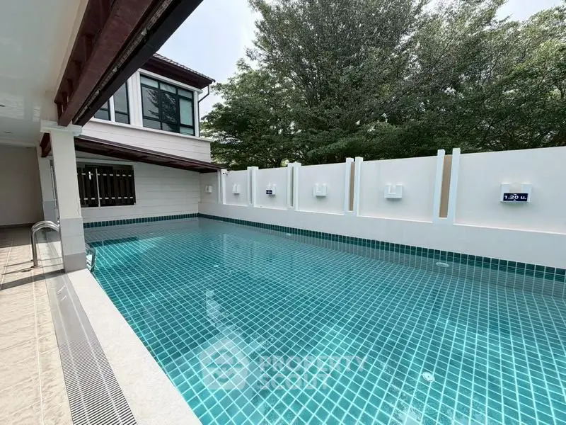 Luxurious private pool with modern design and serene surroundings, perfect for relaxation and entertainment.