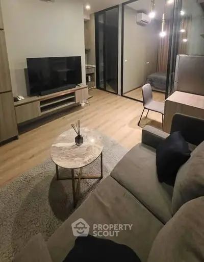 Modern living room with sleek furniture and open layout