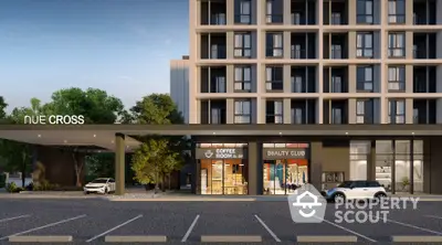 Modern building exterior with retail spaces and parking area