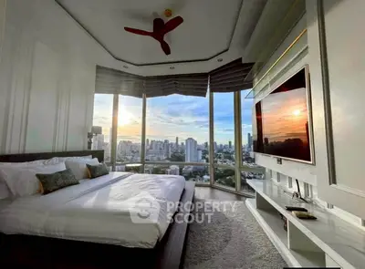 Luxurious bedroom with panoramic city view and modern decor