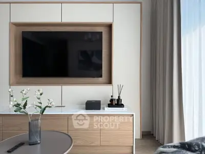 Modern living room with sleek TV setup and elegant decor
