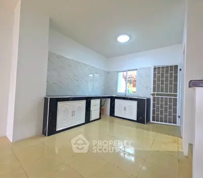 Spacious kitchen with modern design and ample natural light