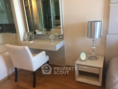 Elegant bedroom with modern vanity and stylish decor