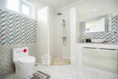 Modern bathroom with stylish tiles and sleek fixtures
