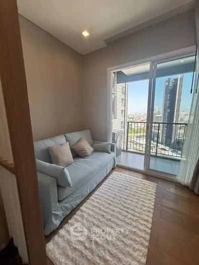 Cozy living room with balcony view in modern apartment