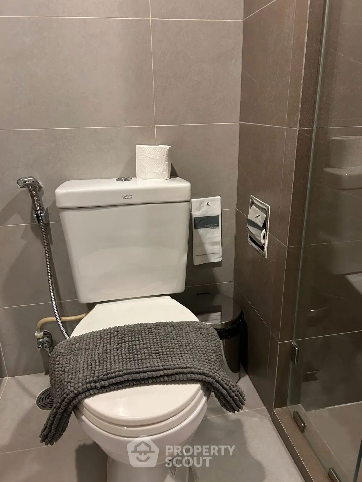 Modern bathroom with sleek design and glass shower enclosure