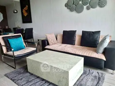Modern living room with stylish furniture and marble coffee table