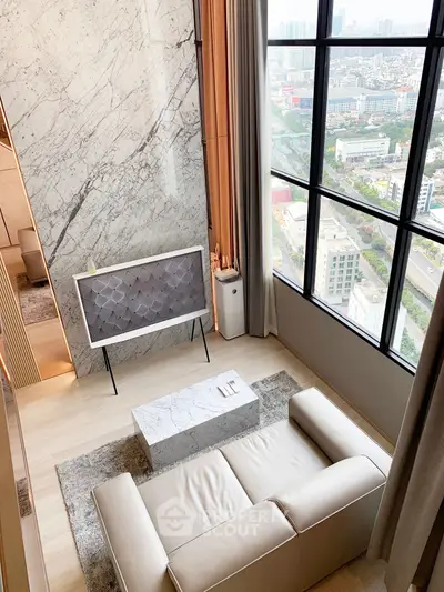 Luxurious modern living room with stunning city view and elegant marble accents.