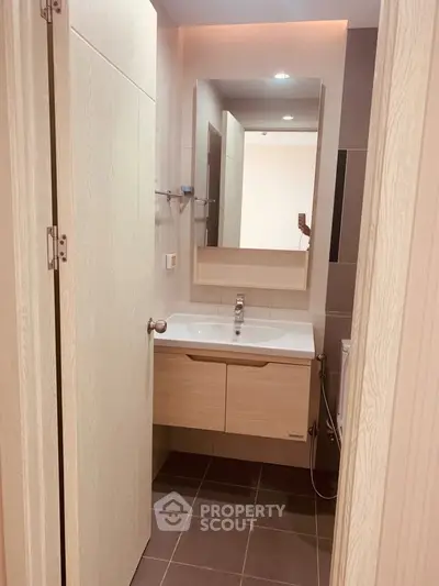 Modern bathroom with sleek vanity and neutral tones