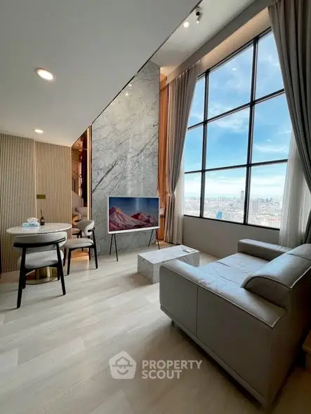 Luxurious modern living room with high ceilings and stunning city view