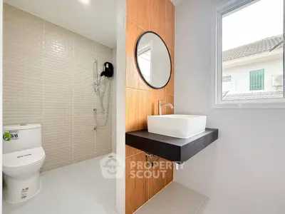 Modern bathroom with sleek fixtures and natural light