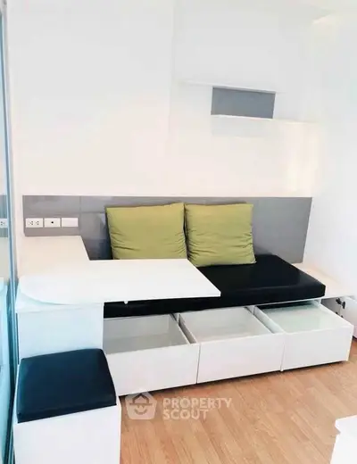 Modern living room with built-in storage and sleek design