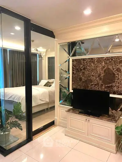 Luxurious bedroom with glass partition and elegant decor