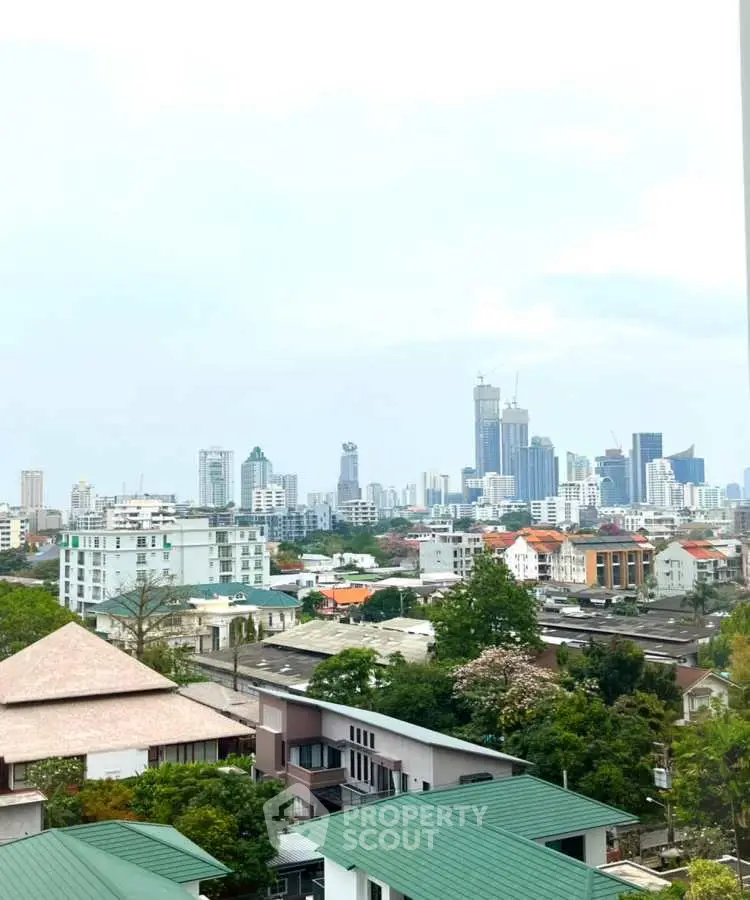 Stunning cityscape view showcasing urban skyline and residential area, perfect for real estate investment.