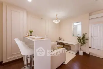 Elegant living room with modern decor and breakfast bar seating