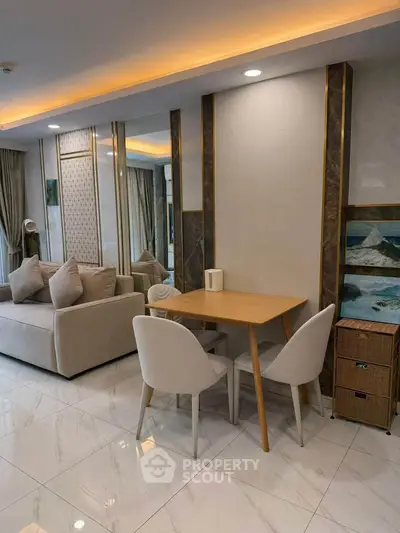 Modern living room with elegant decor and cozy seating area