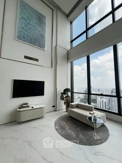 Luxurious high-rise living room with stunning city view and modern decor.