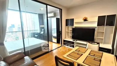 Modern apartment interior with open living room and bedroom, city view balcony.