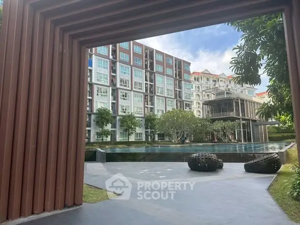 Luxurious apartment complex with stunning pool and modern architecture