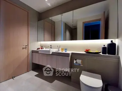 Modern bathroom with sleek fixtures and ambient lighting
