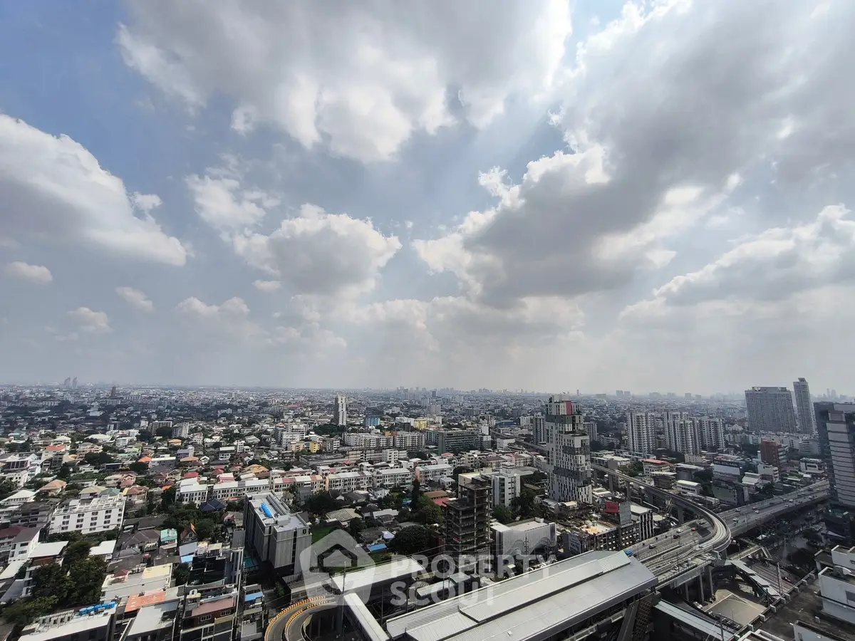 Stunning cityscape view from high-rise building showcasing urban skyline and expansive horizon.