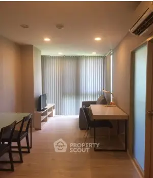 Modern living room with sleek furniture and natural light