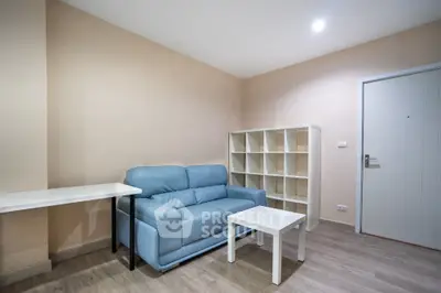 Cozy living room with modern furniture and ample storage space