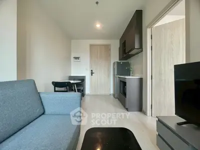 Modern apartment living room with open kitchen and stylish furniture