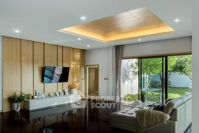 Spacious modern living room with garden view and elegant decor